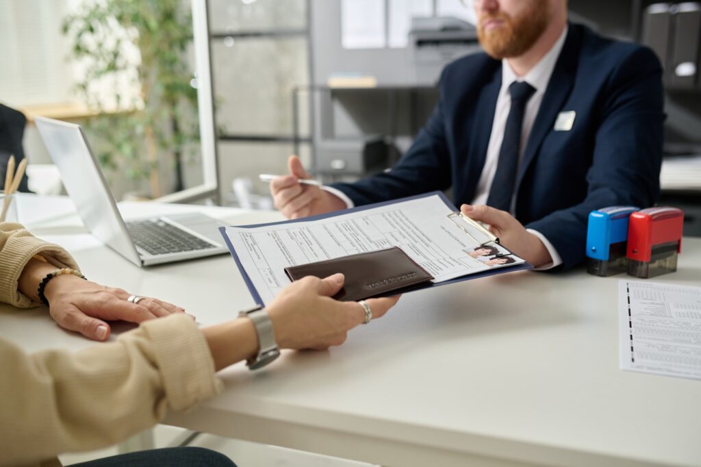 Woman applying for visa in US immigration office